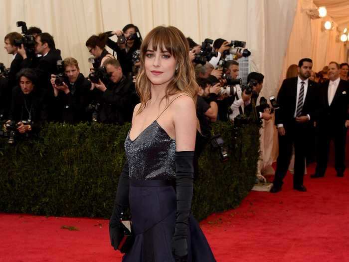 At the prestigious Met Gala in 2014, Johnson wore velvet gloves and a navy outfit designed by Jason Wu.