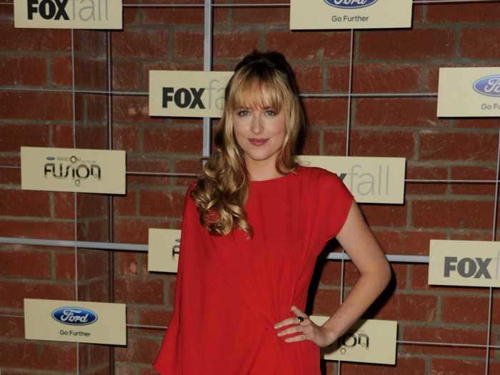 At a party in Culver City, California in September 2012, she wore a bright red dress and nude, strappy heels.