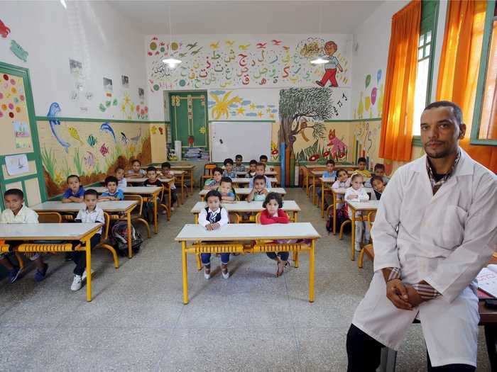 Teacher Moulay Ismael Lamrani posed for a picture with his class in Rabat, Morocco.