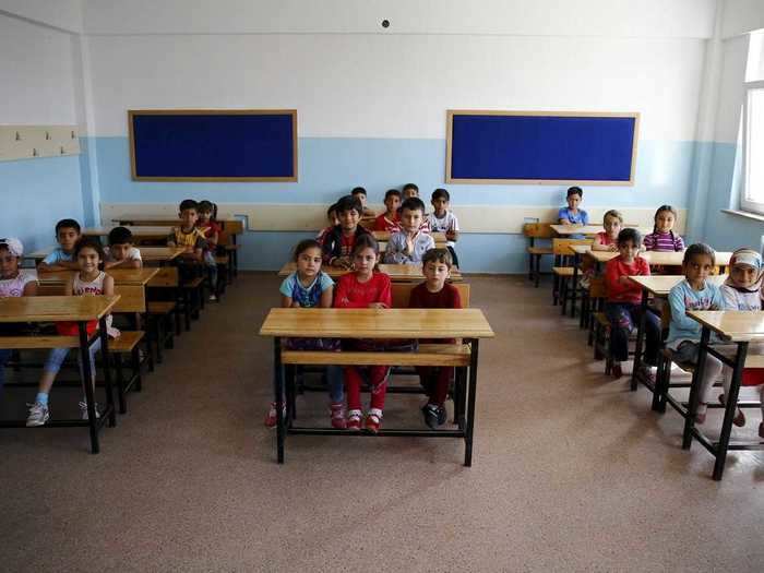 Syrian refugee students in second grade waited for the start of their first lesson in Ankara, Turkey,