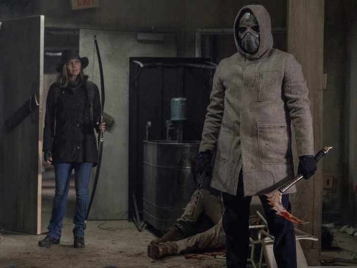 13. Who is the masked person we see with Maggie? It