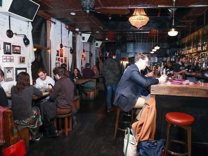 At the corner of Bleecker Street and Barrow Street, perched atop a Five Guys Burgers and Fries, lies an under-the-radar bar dubbed The Garret.