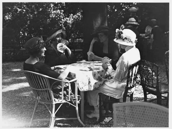 Parisians would wear their fancy attire to garden parties across the city.