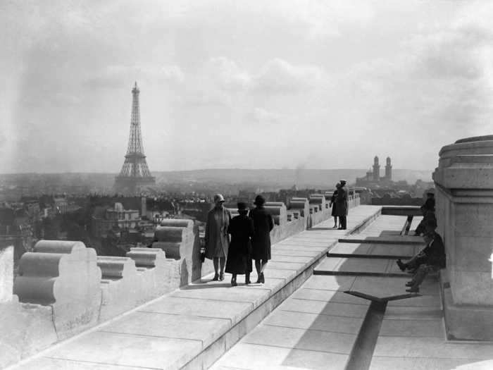 People still visited the Arc de Triomphe to look out on the City of Lights.