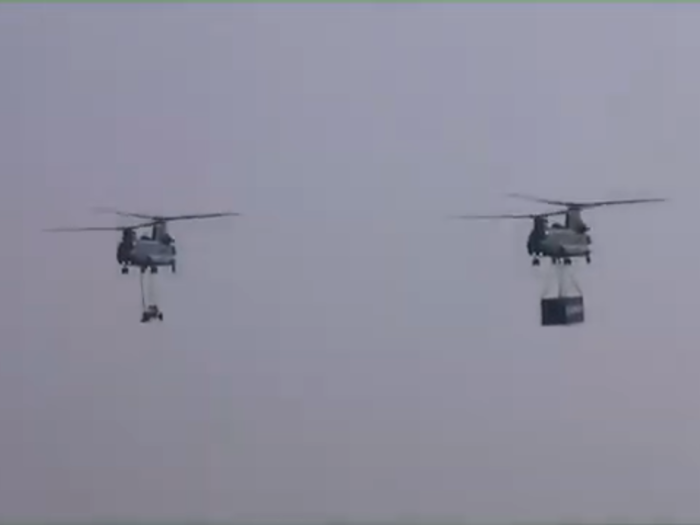 After the Air Force Day 2020 parade, Chinook kicked off the air show. It is capable of carrying 11 tons. To display that capability one was seen carrying a  20-foot sea container and the other, a light fleet gun.