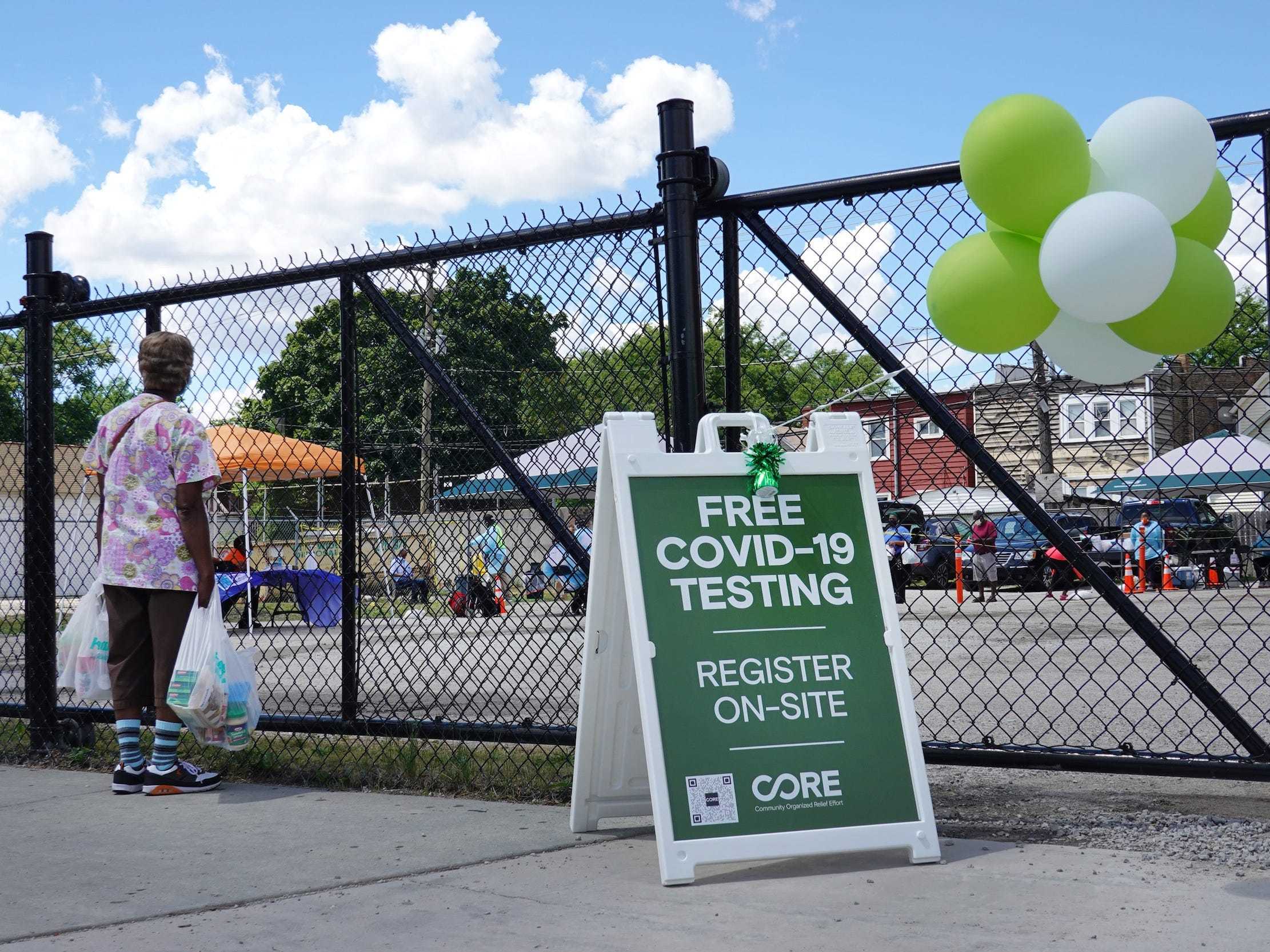 A sign alerts residents to a mobile COVID-19 testing site set up on a vacant lot in the Austin neighborhood on June 23, 2020 in Chicago, Illinois. The site is one of four mobile testing sites, two community-based sites and two first-responder-focused sites being implemented by the city.