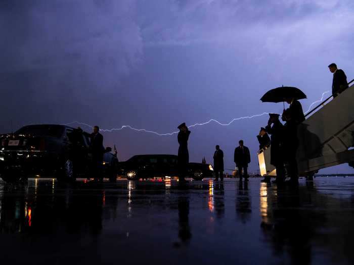 A lightning bolt stretched across the sky as President Trump departed Air Force One in 2020.