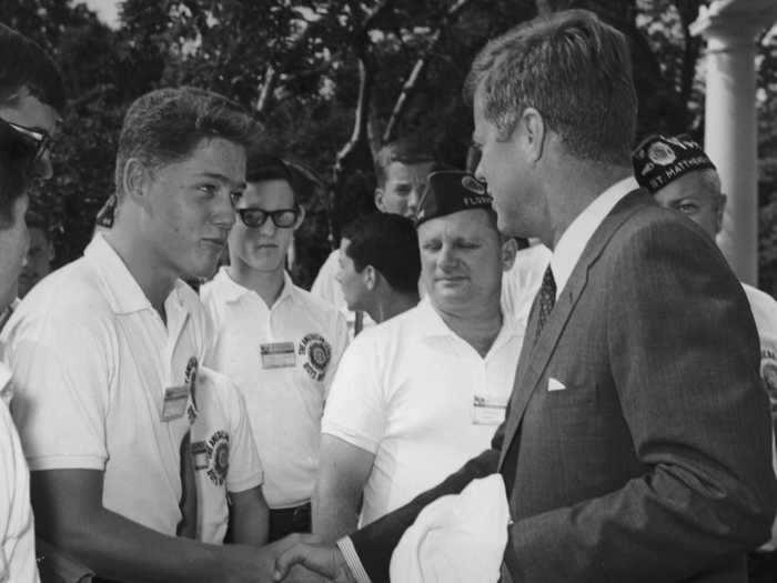 Bill Clinton, then just 16, was photographed shaking hands with President Kennedy during a White House visit in 1963.