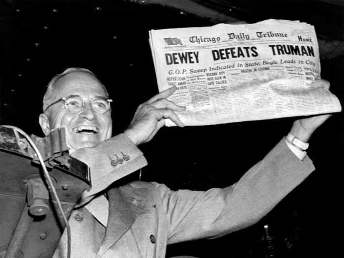 A gleeful Harry Truman held up a misprinted edition of the Chicago Daily Tribune saying he