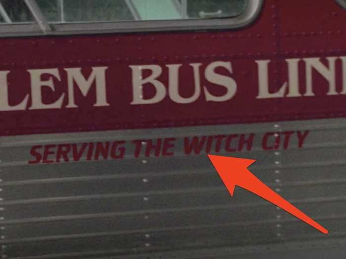 "Serving the witch city" is written on the side of the bus the Sandersons get on.