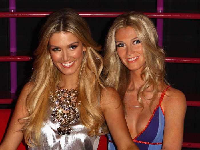 Singer Delta Goodrem sat next to her incredibly realistic wax figure.