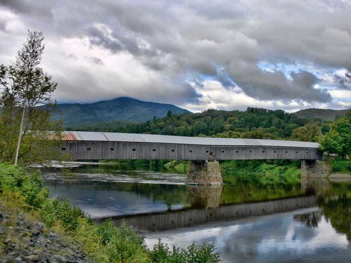 The Cornish-Windsor Bridge connecting New Hampshire and Vermont is the longest wooden bridge in America.