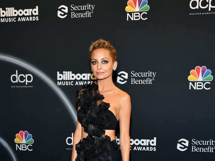 Nicole Richie looked stunning in a one-shoulder, sheer floor-length Christian Siriano gown.