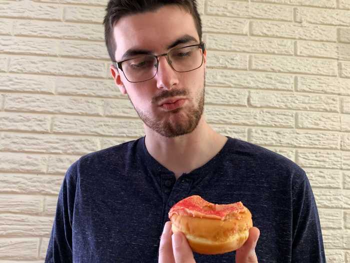 Here you can see him considering the flavor, which he eventually compared to the cinnamon candies Hot Tamales.