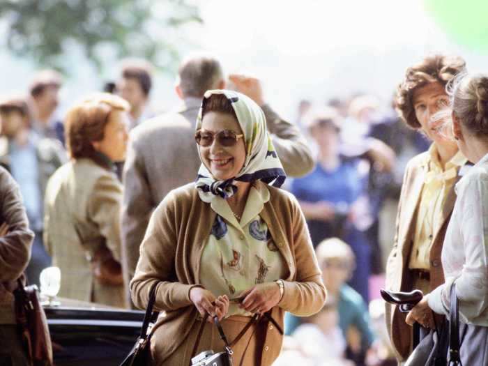 Queen Elizabeth also wore a matching camel cardigan and skirt to a horse-racing event in 1982.