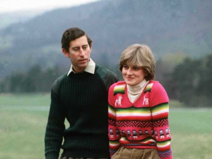 Princess Diana embodied fall style while wearing a Fair Isle sweater, white turtleneck, khaki-colored corduroy pants, and green rain boots after her engagement to Prince Charles was announced.