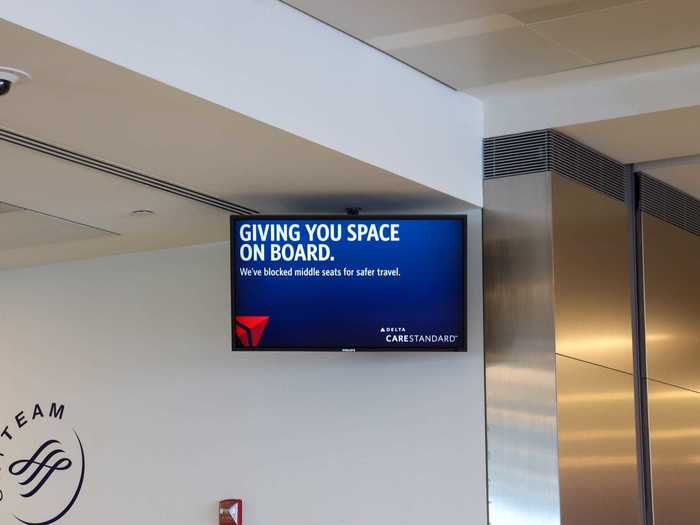 And even before the announcement, screens above the gate area are constantly reminding passengers of all the measures being taken by Delta including blocking middle seats...