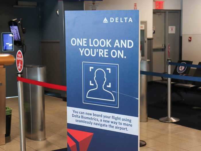 Most Delta gates at JFK also have biometric boarding gates where passengers stand in front of a camera instead of handing their boarding pass to an agent. The service is typically available on international flights where biometric data is taken from a traveler