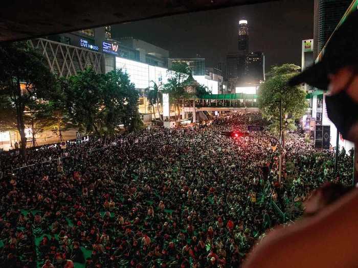 Thousands of people defied the emergency decree hours after it was issued on Thursday, gathering in Bangkok