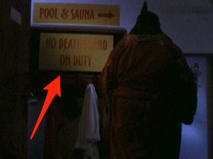 The Halloweentown pool puts a spooky twist on the typical "Lifeguard on Duty" sign.