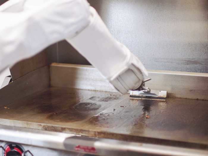 The first version of Flippy could detect when raw patties were placed on the grill and monitor them to cook to order. It also cleaned spatulas and scraped the grill in between burgers.