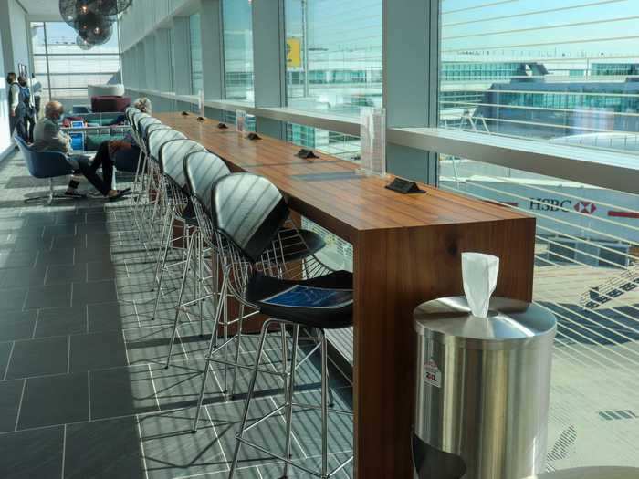 And unlike the bars, these tables – located on both levels – feature pop-up power outlets and USB charging ports.