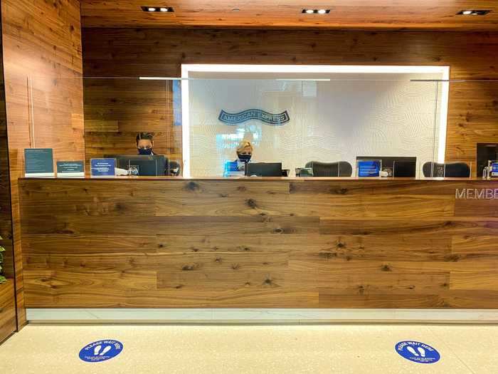 Flyers visiting a Centurion Lounge during the pandemic will immediately notice new safety features including plexiglass partitions and social distancing floor placards at check-in.