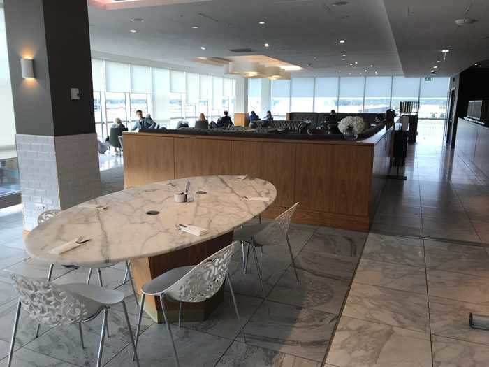 The tables in the main dining area were a mix of luxurious marble, industrial metal, wood, and plain white.