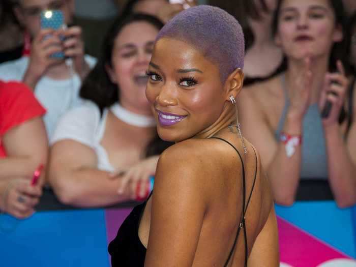 In 2017, Palmer shaved her head and dyed her hair purple.