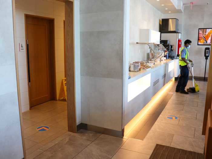 Social distancing reminders lead the way into the lounge, with cleaning staff almost always around to immediately clean any used areas, furthering the sense of safety.