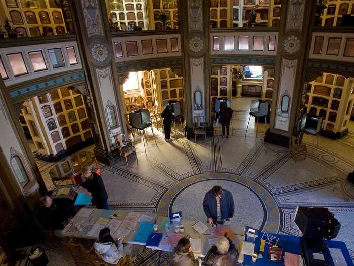 Thousands of cremated remains surrounded voters casting their ballots at the Neptune Society Columbarium in San Francisco, California.