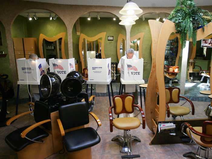 In 2006, voters cast their midterm ballots at a polling place inside Visions Hair Salon in Downey, California.