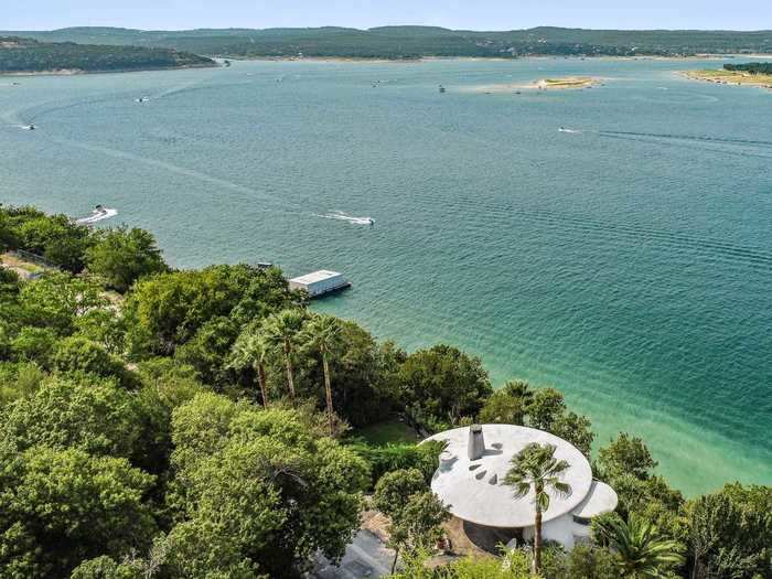 Designed in 1979 by architect John Covert Watson, an apprentice to Frank Lloyd Wright, the home is well known to boaters on Lake Travis, according to Weird Homes Tour.