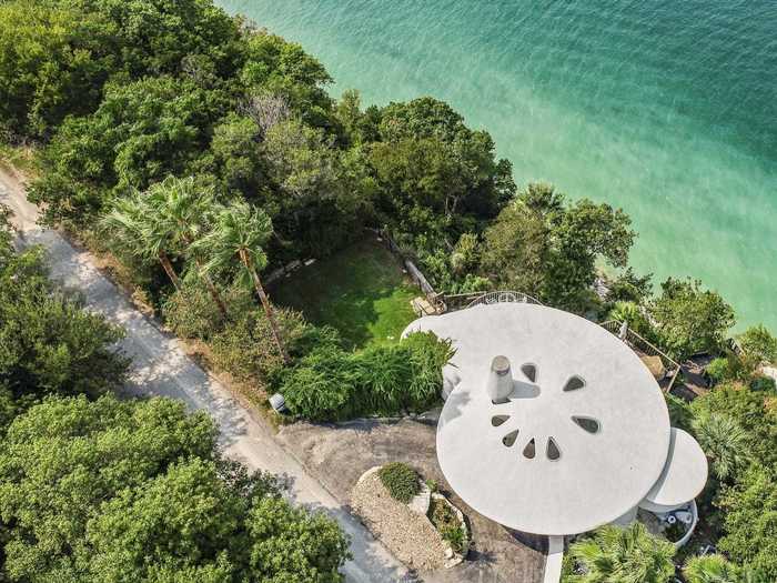 A lakefront home dubbed an "Austin icon" by travel company Weird Homes Tour has hit the market for $2 million.