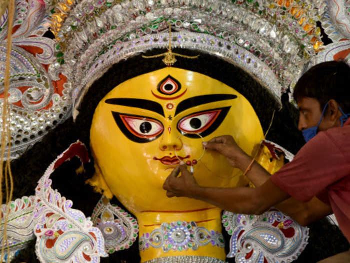 The puja committee has decided to do away with the tradition of a tall idol this year. In fact, it has unanimously decided against the installation of an idol itself. Instead a 20 feet tall poster of goddess Durga will be installed.