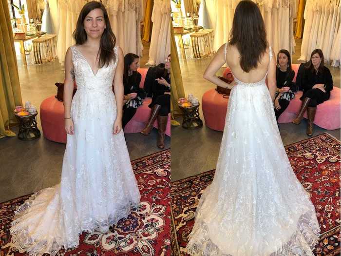 The first dress she tried on was a floral gown with thick straps and a plunging neckline.