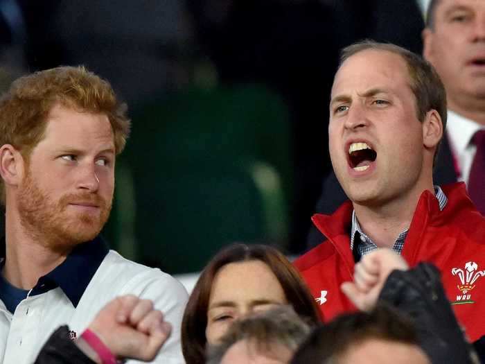 ... and here he is watching the Rugby World Cup with Prince Harry.