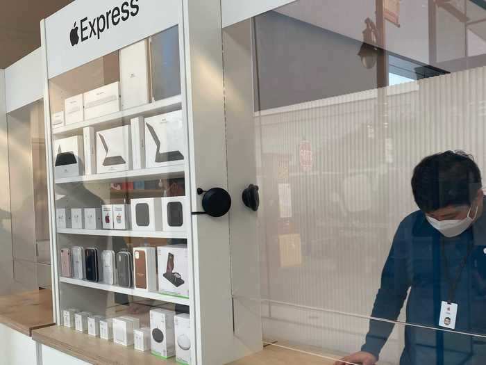 There are shelves between the sales counters that showcase Apple products like iPhone cases and AirPods. However, like the counters, the accessories will be behind a panel.