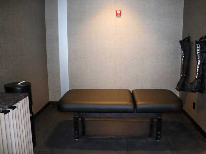 Opposite the workout space is a stretching table with compression socks that help increase blood flow, useful on planes as passengers are sitting for the duration of the journey.