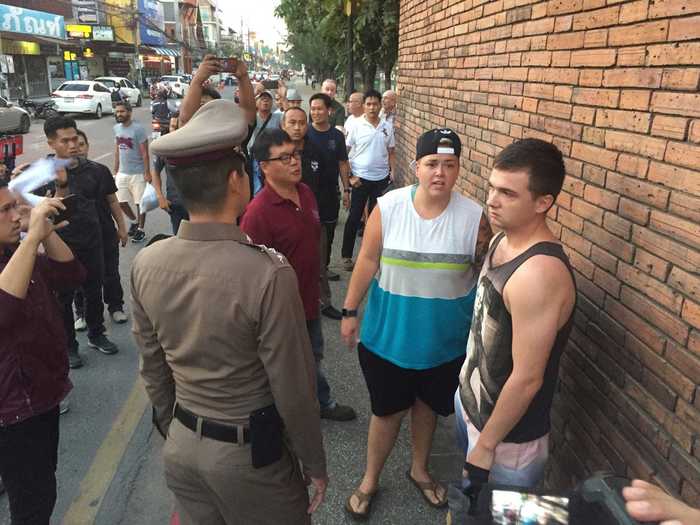 Two tourists narrowly avoided up to 10 years in a Thai prison for spray-painting a brick wall from the 13th century.