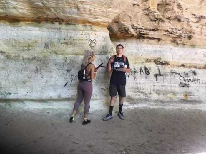 Two visitors to Starved Rock State Park in Illinois allegedly drew their initials on an over 400 million year-old sandstorm formation that