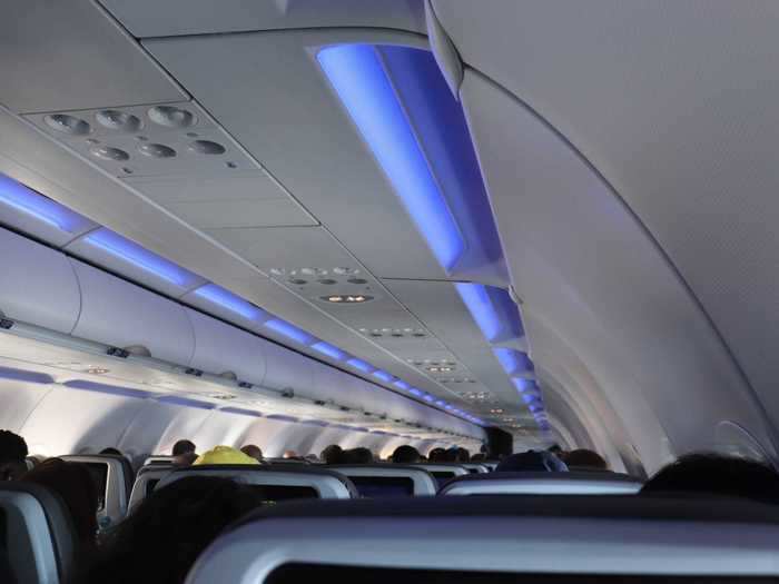 Once we were settled into the aircraft, the mood-lighting kicked in. A soft shade of blue, of course, filled the aircraft.