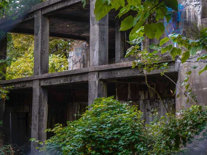 If you walk up to the fenced-in, overgrown area, you can get a peek of the massive structure.