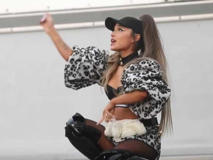 Grande kept it cool in leopard print and patent-leather boots for the "Monopoly" video.