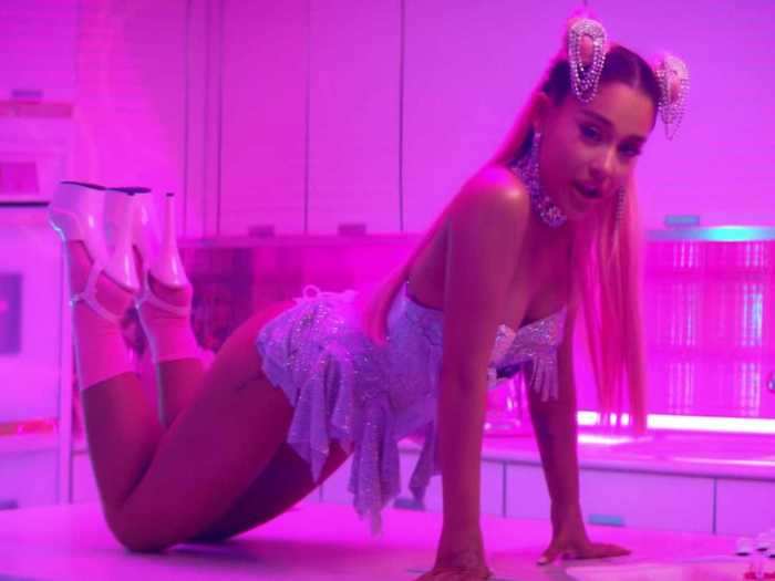 In other "7 Rings" shots, Grande took bling to a whole new level.