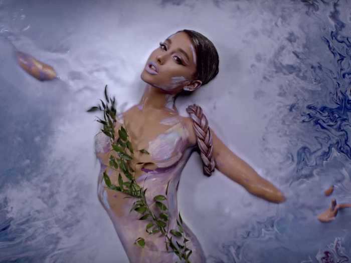 Grande wore body paint in some shots of the "God Is a Woman" music video.