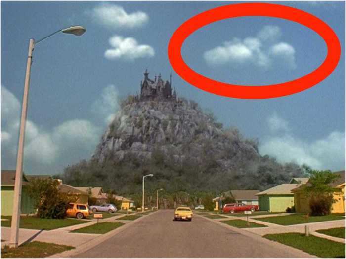 When Peg drives up to the castle, one of the clouds is shaped like scissors