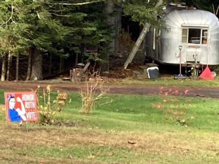 In Cushing, a sign encourages "Honor Ruth. Vote."