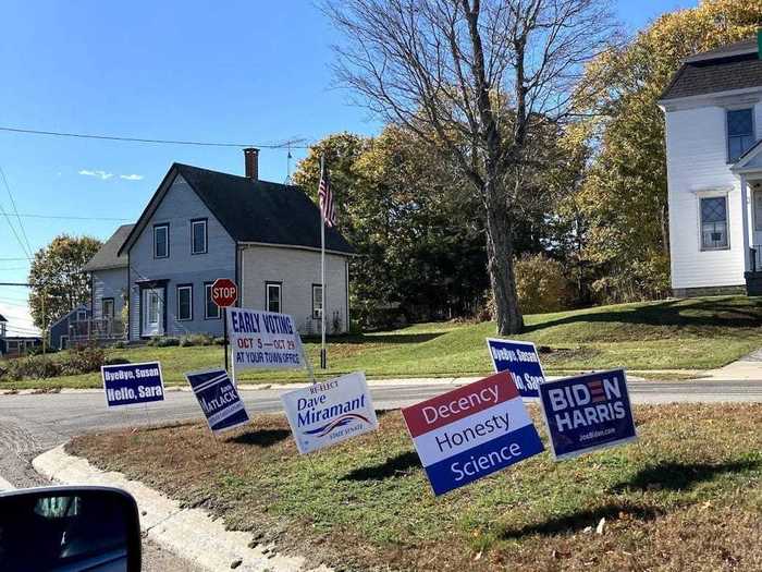 A group of yard signs grace another island in St. George.