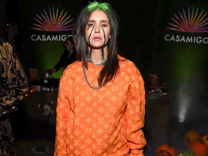 Nina Dobrev nailed her Billie Eilish costume.